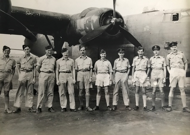 Denys Sutton, 3rd from right, with his Liberator crew in Nassau in 1944