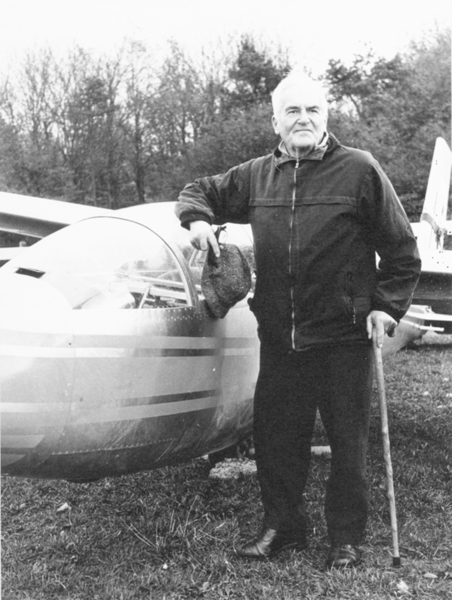 Air Commodore Arthur Wray standing beside his glider.