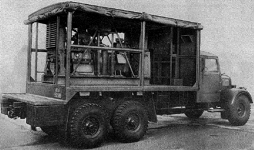 Ford, 3 ton, 6x4, Model WOT 1 chassis with 10 kVA power and charging equipment - open