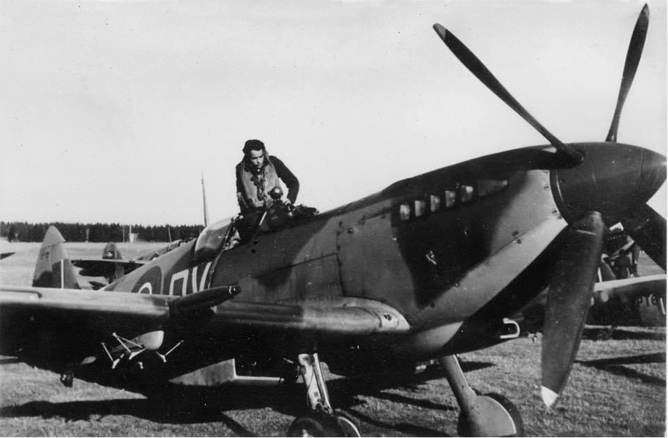 Peter Anthony Nicholson of No 129 Squadron climbing into his Spitfire