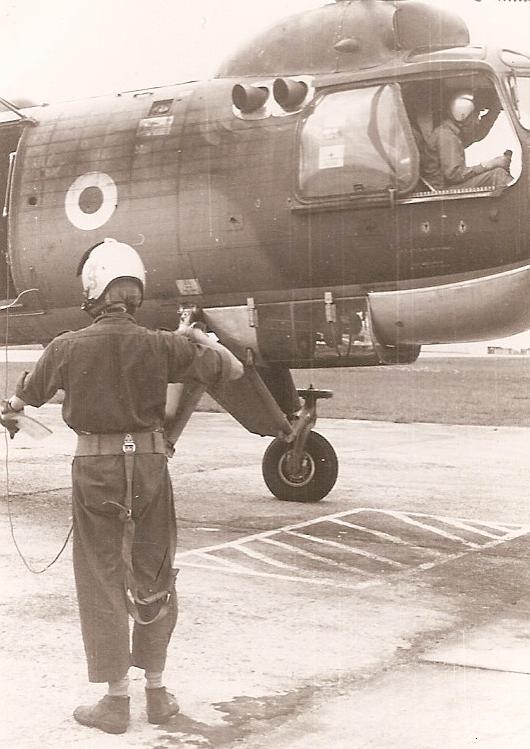 Crewman of No 66 Sqn preparing for a flight 3